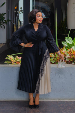 Nora Belle black and cream pleated Miyake dress with collared V-neck, side waist tie and black lace detail
