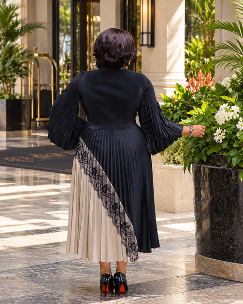 Nora Belle black and cream pleated midi dress with contrast cream side panel and lace detailing